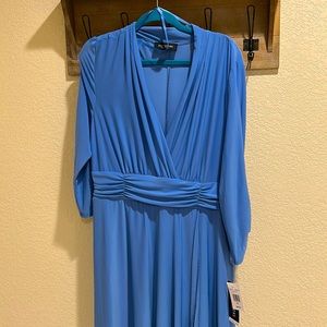 V-Neck, wrapped waist flowing periwinkle dress.